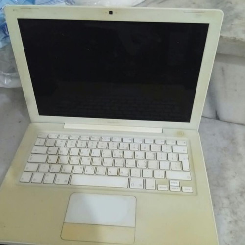 Apple MacBook white laptop