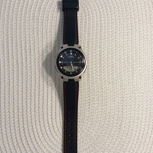 Casio Illuminator WR50M wristwatch like new with red stitched strap