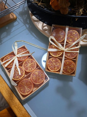 Orange candles new packages with orange hemisphere scent