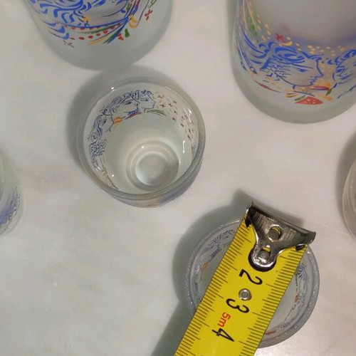Set of 2 carafes and 6 shot glasses decorated with Giorgos Stathopoulos art