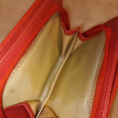 Coral wrist wallet like new synthetic leather