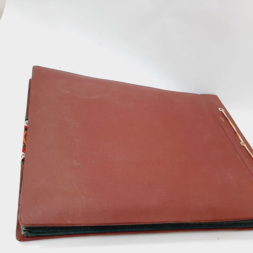 Vintage photo album with brown embossed fabric and embroidery, 35 leaves