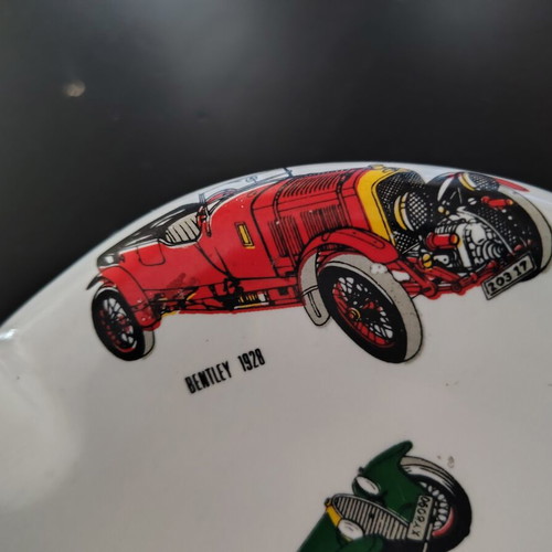 Ceramic ashtray used with vintage car designs