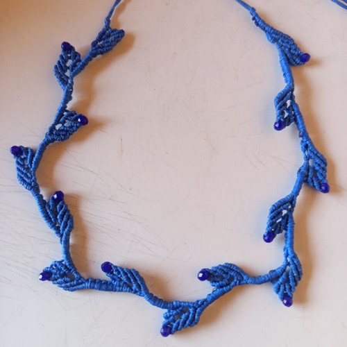 Handmade macrame necklace with blue leaves, new