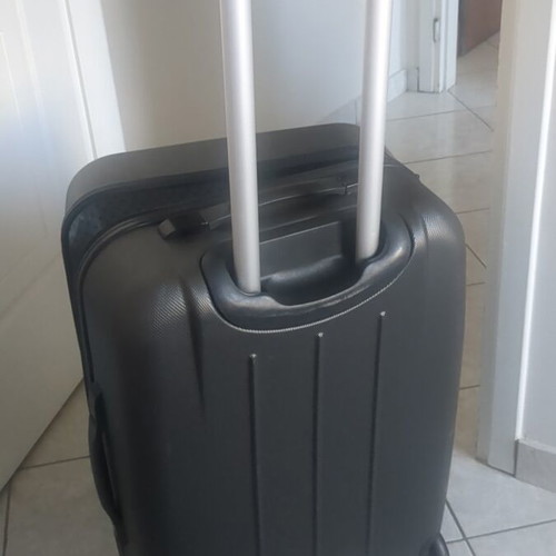 Medium hard suitcase gray used with two wheels