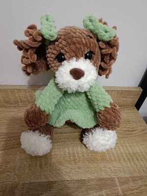 Handmade crocheted dog new with plush yarn and green dress