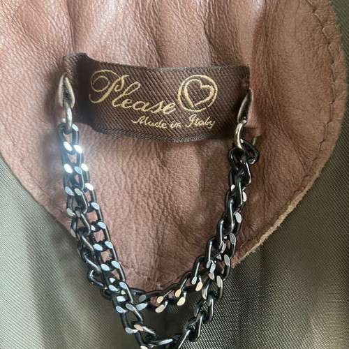 Short jacket used, tan leatherette with camouflage patches