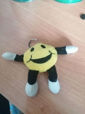 Smiley keychain like new, black and yellow