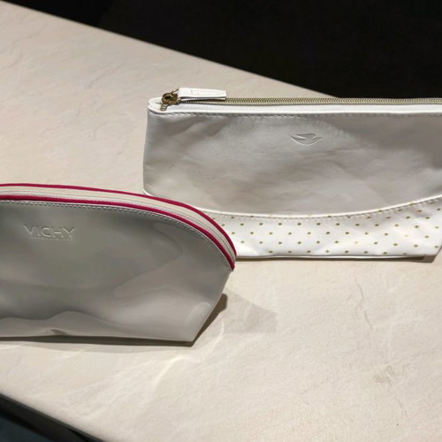 Vichy and Dove toiletry bags new, white, spacious