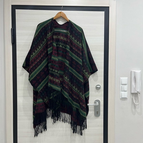 Women's wool cape used with multicolor pattern