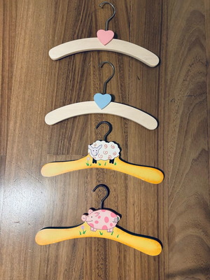 Wooden baby hangers set of 4 like new
