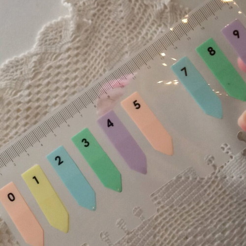 Multicolored pastel bookmarks used