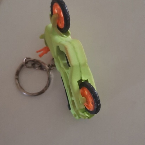 Vintage motorcycle and bicycle keychains used, colorful
