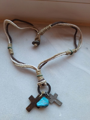 Necklace like new with woven cords, wooden cross, metal cross, and turquoise stone