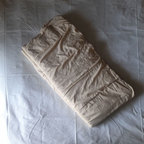 Single bed quilt used, reversible beige and red