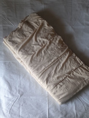 Single bed quilt used, reversible beige and red
