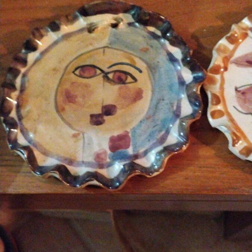Ceramic plates like new with hand-painted traditional designs