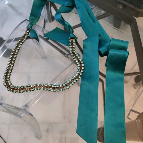Necklace used with satin ribbon and stones