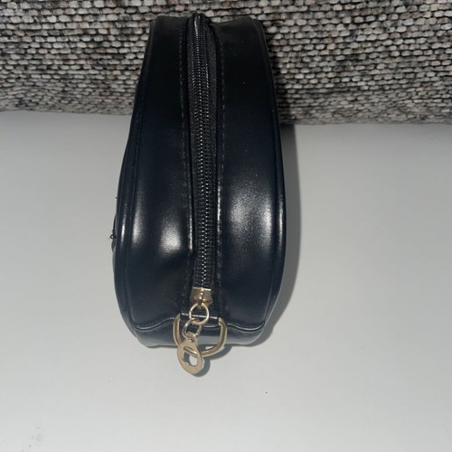 Belt bag with embossed quilted heart design, new