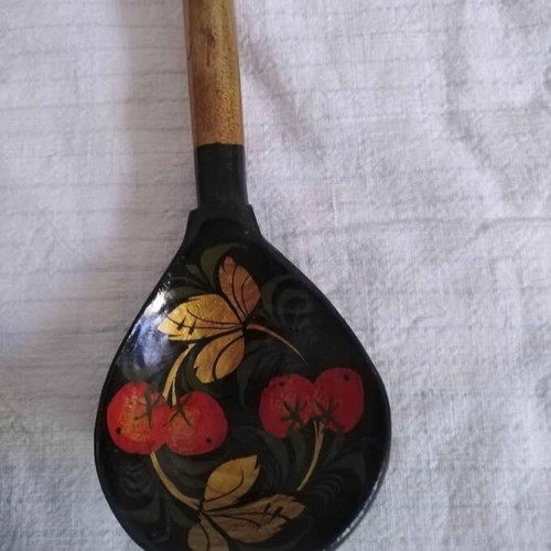 Set of three handmade wooden Russian spoons used, hand-painted