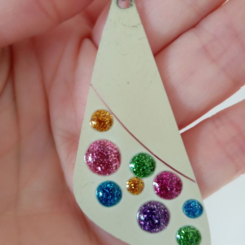 Earrings used, plastic with glitter