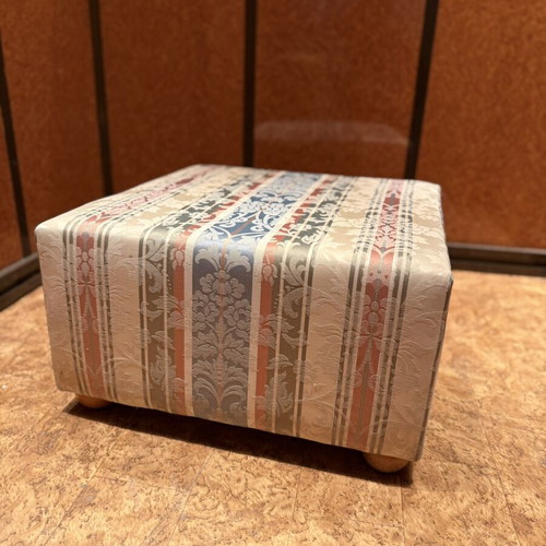 Vintage storage stool used with fabric design and wooden legs