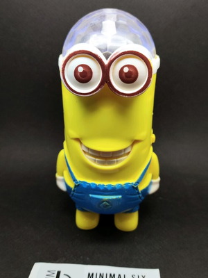 Minion figure used with rotating light and sound