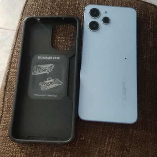 Xiaomi 12 smartphone like new, 4GB RAM, 128GB storage, blue
