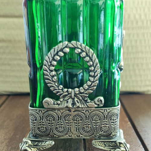 Vintage Italian glass bottle in metal base like new