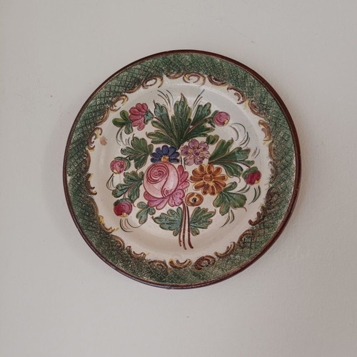 Decorative ceramic plate with hand-engraved floral motif, like new