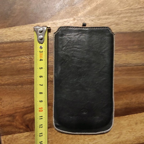 Tom Taylor leather phone case used