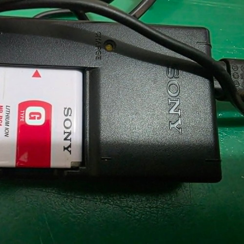 Sony Cyber-shot DSC-W70 digital camera with battery and charger