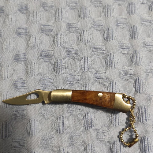 Pocket knife like new, silver and brown, 7 cm