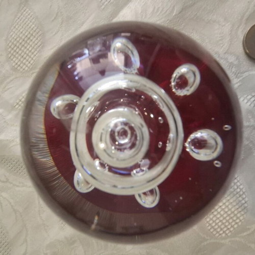 Glass paperweight decorative with red bubbles like new