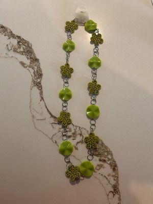 Necklace with green and gold designs