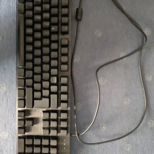 Logitech G413 SE mechanical gaming keyboard used with illuminated US keys