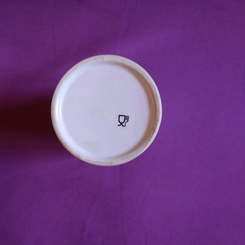 Toothbrush and toothpaste holder stand like new in white and beige