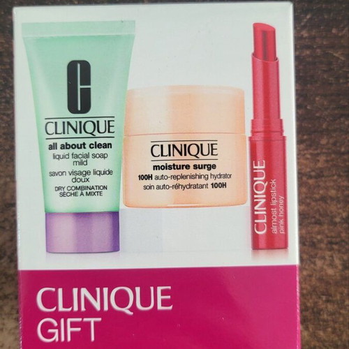 Clinique travel set new with cleanser, moisturizer, and lipstick