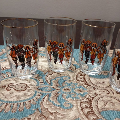 Bohemian vintage set of 9 glasses with Three Musketeers theme, like new
