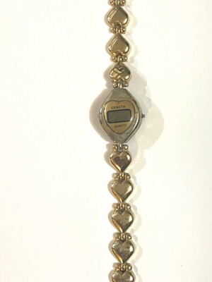 Quartz wristwatch used, gold color, women's