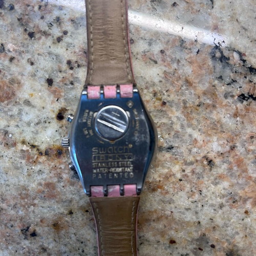 Swatch wristwatch used with chronographs and date, pink