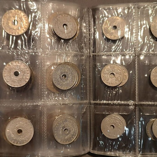 Album of 60 collectible coins