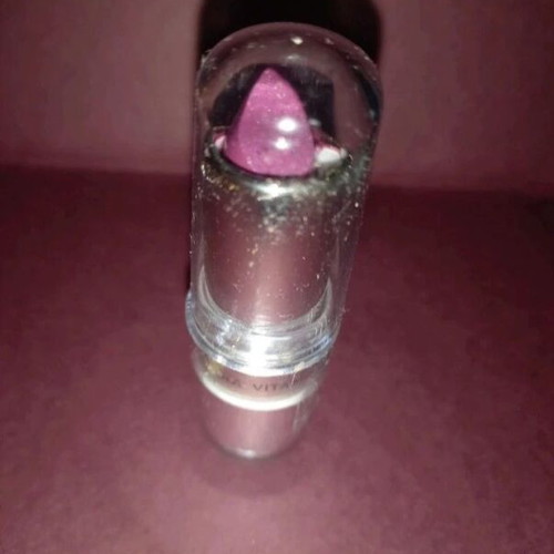 Purple lipstick shiny new with subtle glitter