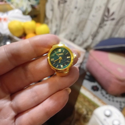 Vintage ring new with functional gold watch and green dial