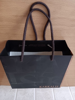 Karkalis luxury paper gift bag used with brown cord handles