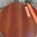 Wooden extendable round dining table used