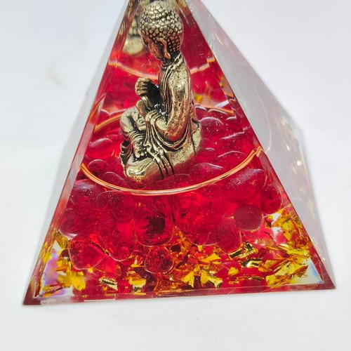 Orgonite pyramid with Buddha and red quartz like new