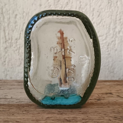 Vintage decorative ship in glass bottle used