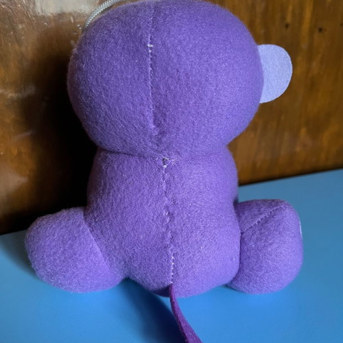 Plush monkey toy used