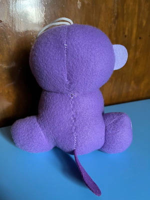 Plush monkey toy used